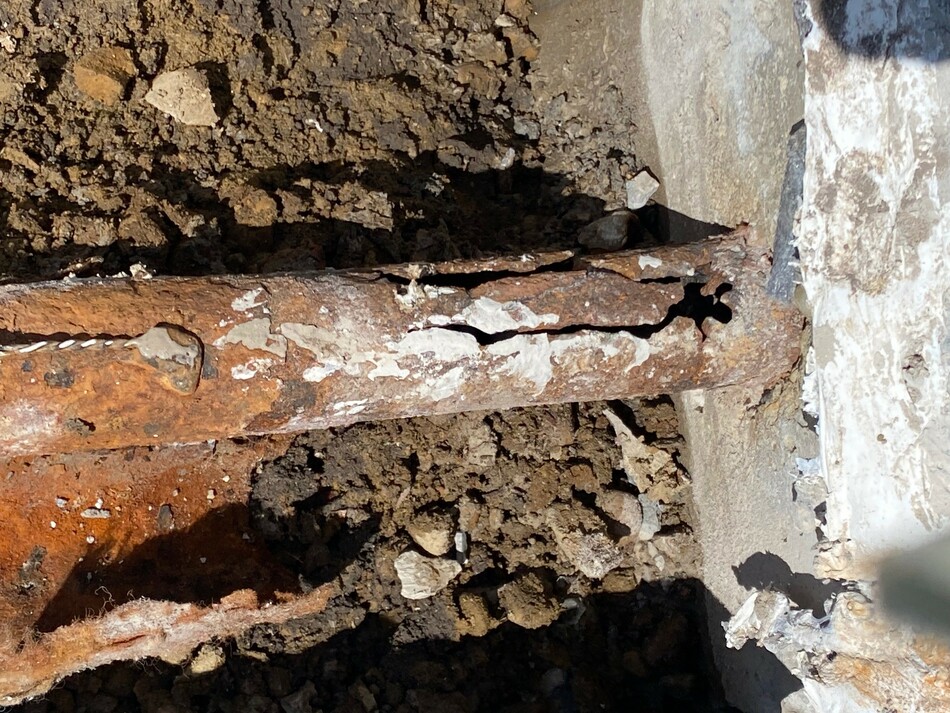 Corroded pipe discovered under concrete at the Rotary Fountain causing significant leak